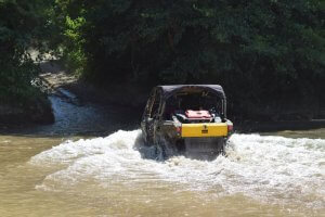 Side by Side Vehicle going through water safety